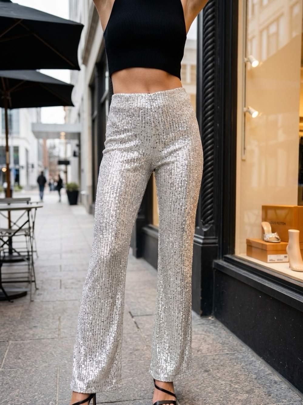 Women’s silver sequin stretch flare pants size medium by ‘idem ditto’​